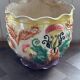 Earthenware cache-pot from the early 20th century.