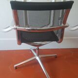 Una Chair armchair in black mesh published by ICF