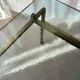 Swedish brass coffee table with a marbled glass top from the 1960s.