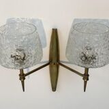 Pair of bronze sconces with worked glass reflectors