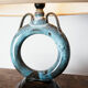 Lampe porcelaine avec son apparence en forme de rond