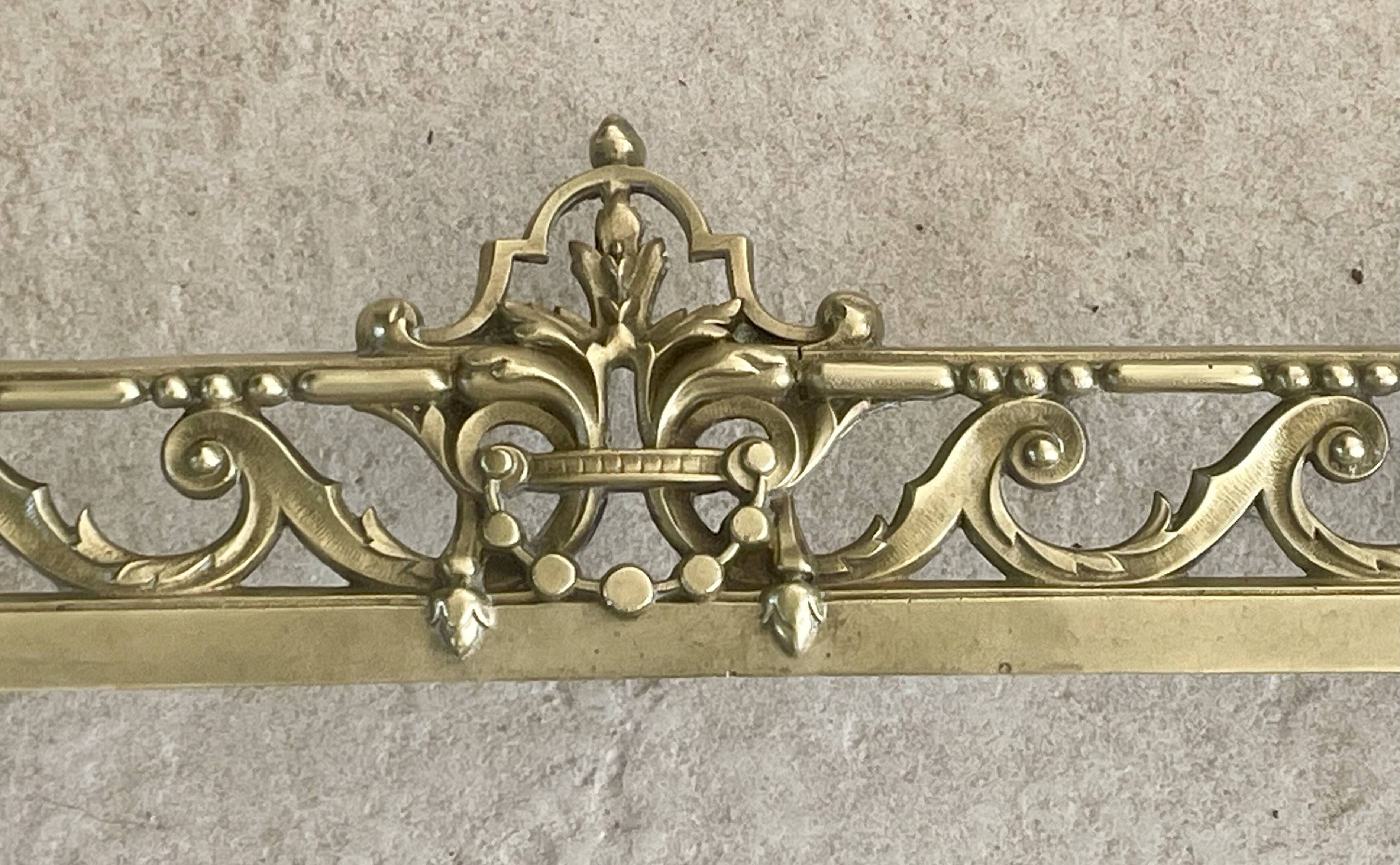 19th-century brass fireplace threshold bar