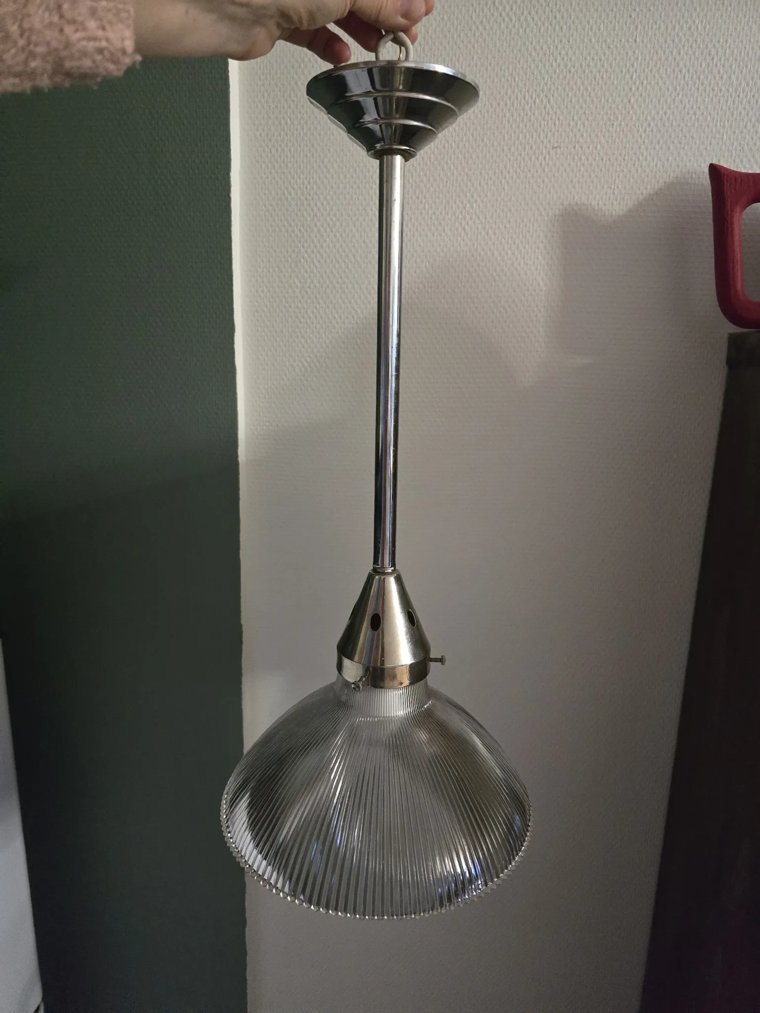 Vintage globe-style holophane on a chrome stem.