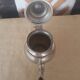Oriental teapot silver metal