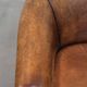 Vintage club chair in sheepskin leather with a characterful look