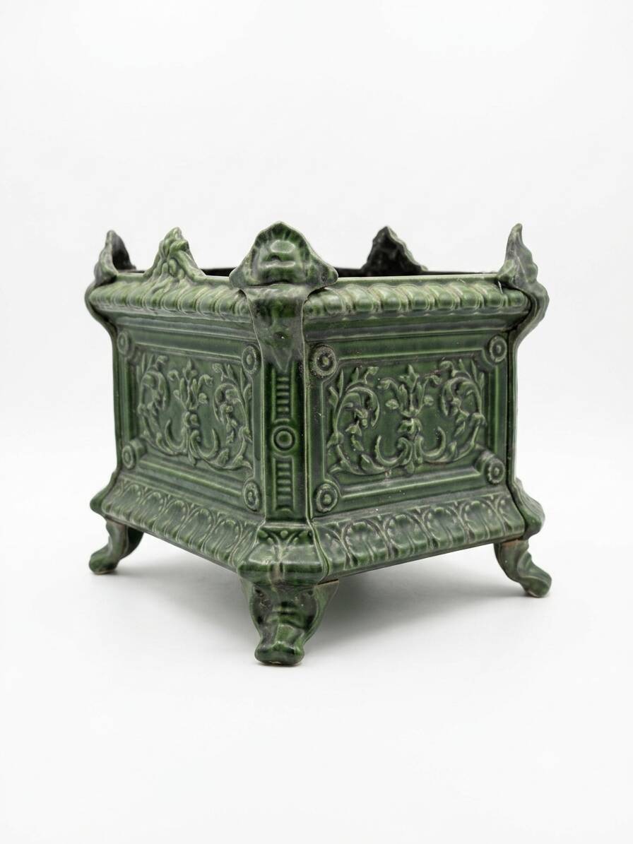 Antique enamelled cast iron planter in the Napoleon III style.