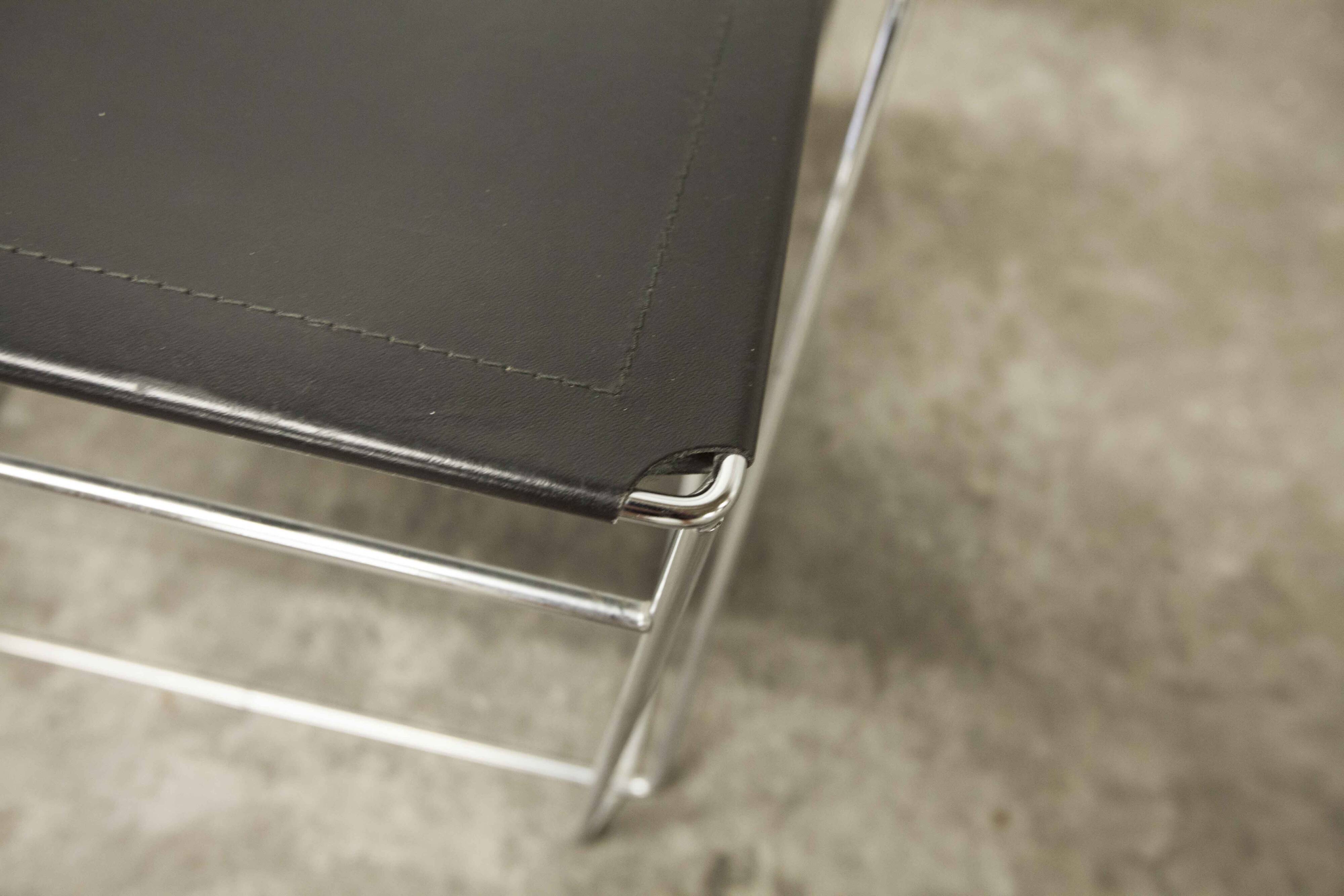 Set of 3 minimalist X line chairs by Niels Jorgen Haugesen.