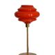 Table lamp with a vintage orange globe from an old pendant light