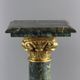 Pair of green marble columns, gilded bronze and gilded brass, 20th Century