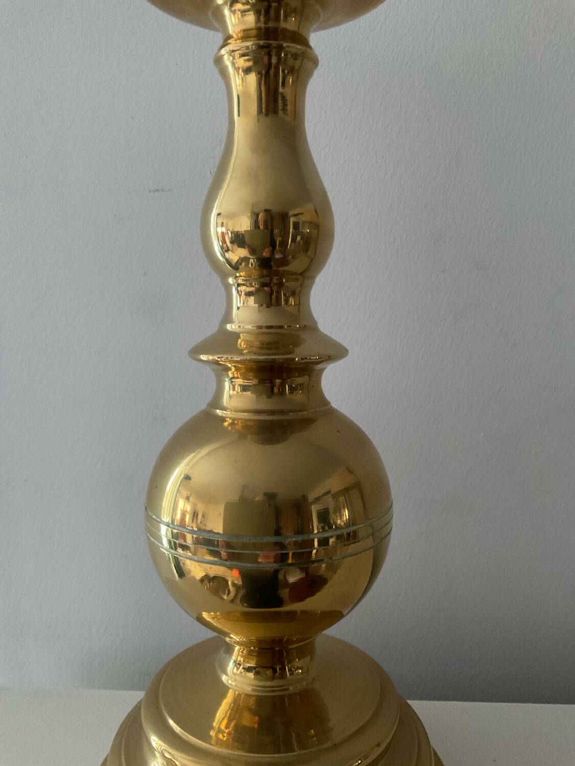 Antique candle holder in solid bronze