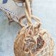 Suspension boule en file de rotin