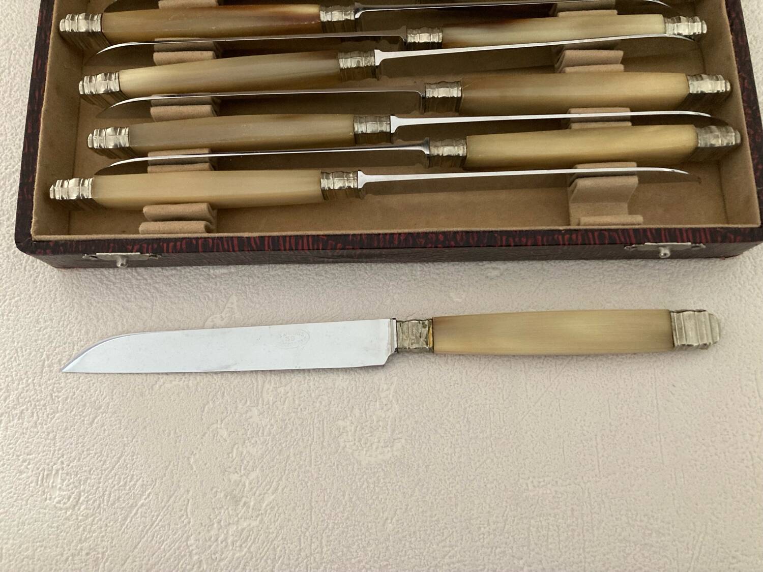 Complete Set of 12 Stainless Steel Cheese Knives with Bakelite Handles and Art Deco Ferrules