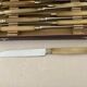 Complete Set of 12 Stainless Steel Cheese Knives with Bakelite Handles and Art Deco Ferrules