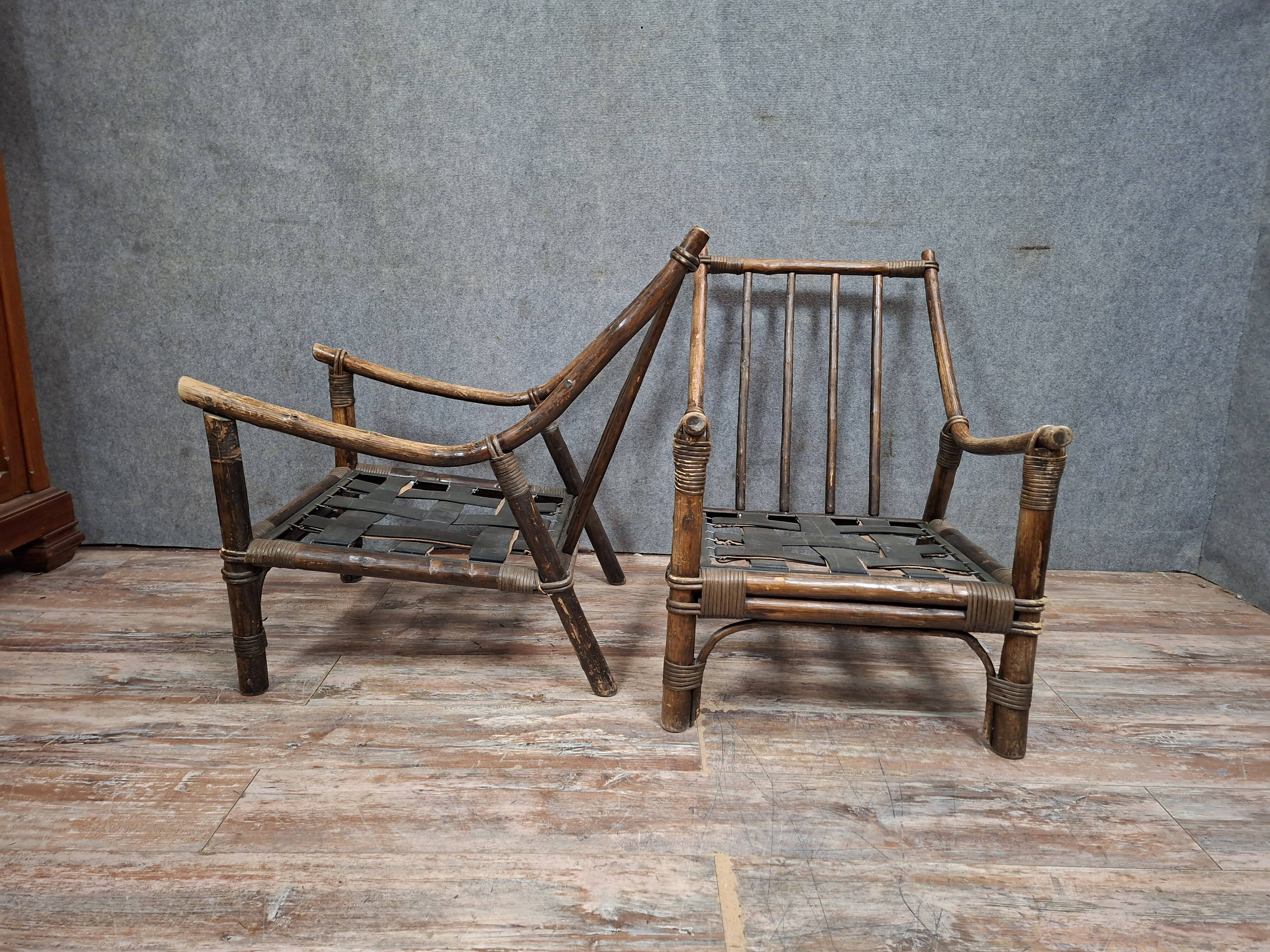 Pair of low bamboo armchairs with an exotic spirit, dating from the early 20th century.