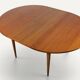 Round extendable dining table in teak – 1960s
