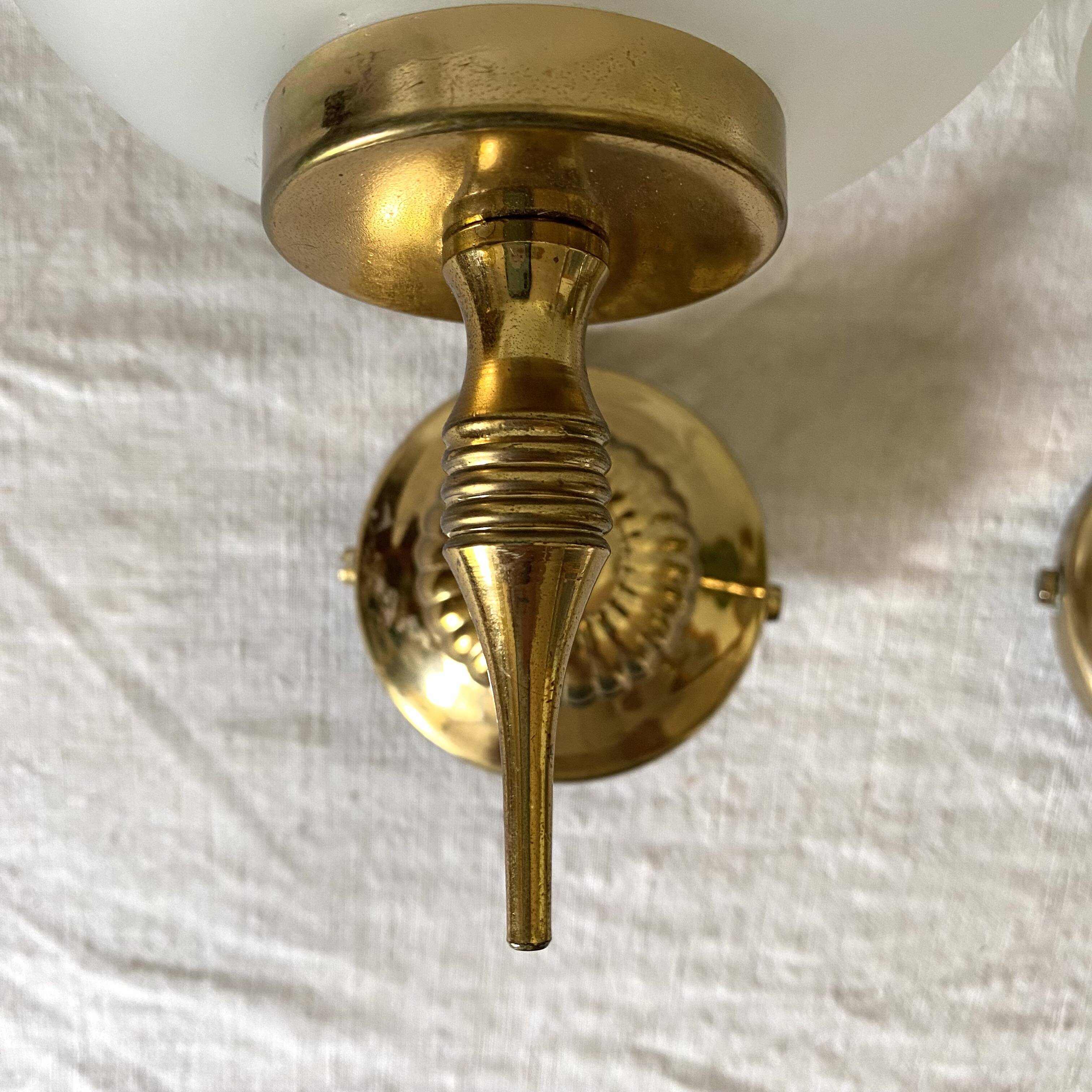 Pair of glass and brass wall lights