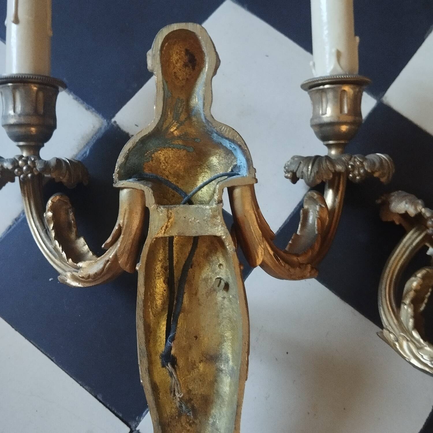 Paire d'appliques cariatides bronze doré