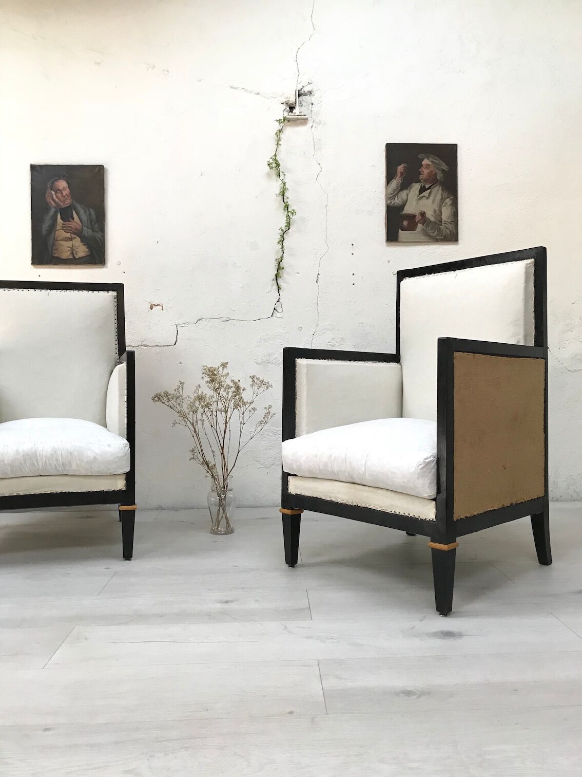 Pair of blackened wooden armchairs