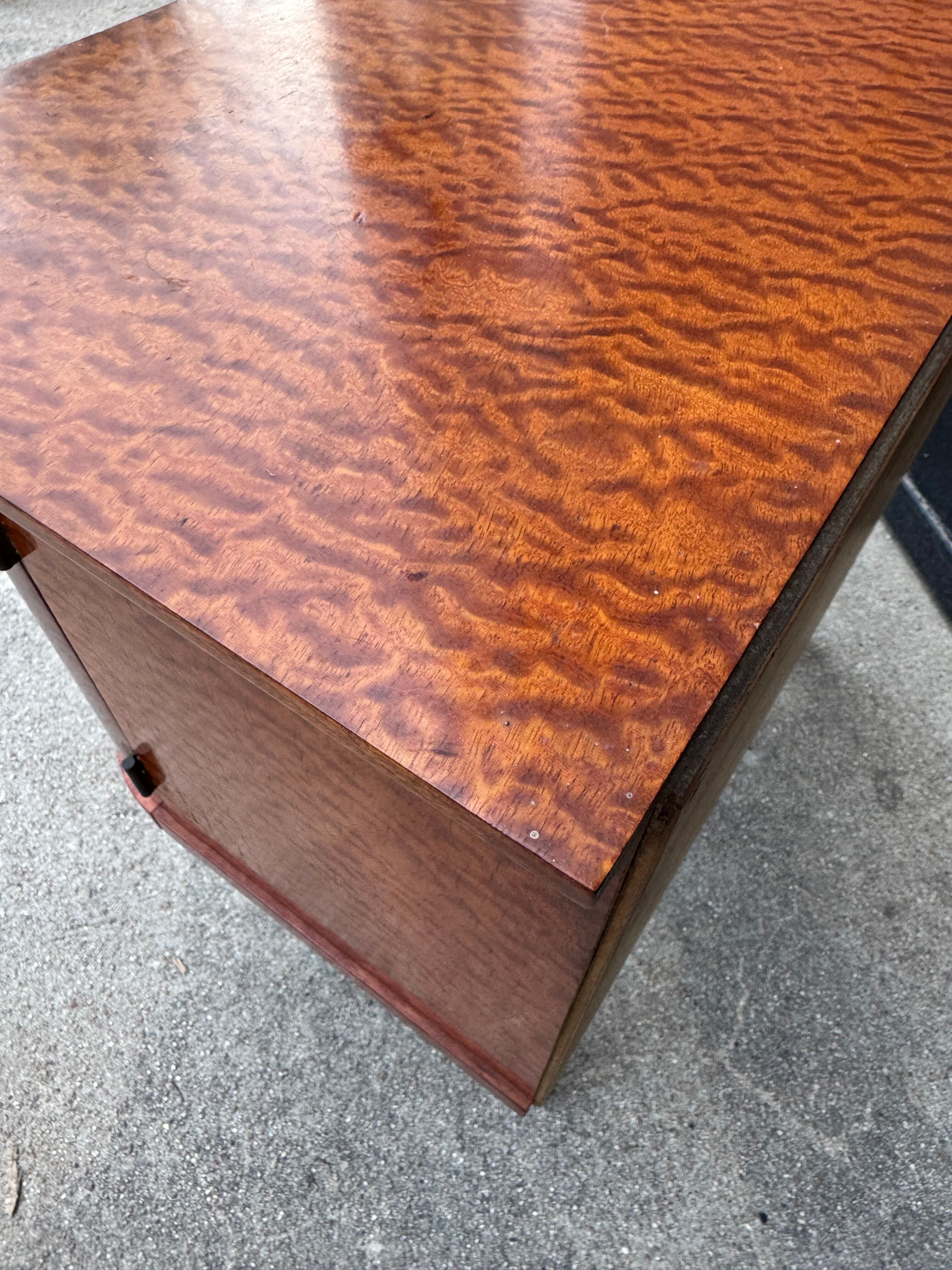 Mahogany veneered bedside table from the 1950s.