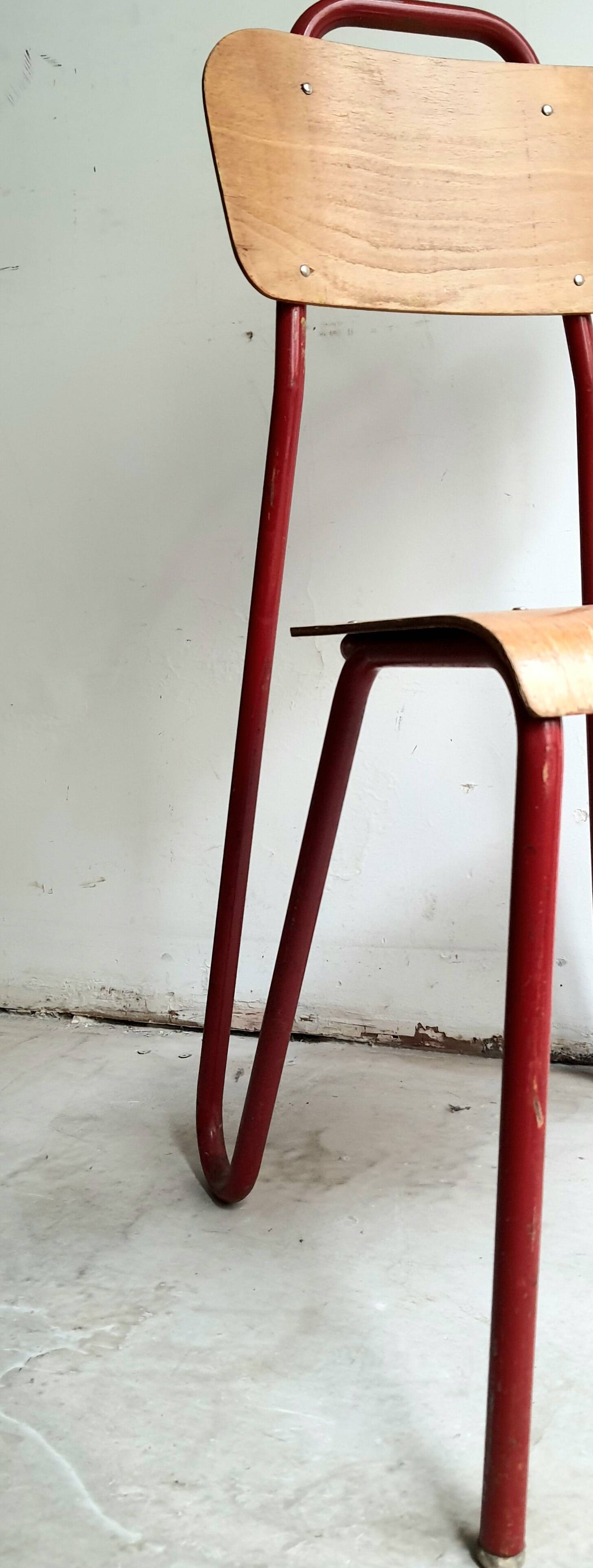 Rare pair of chairs in red tubular metal and wood  Vintage 1960