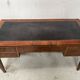 Louis XVI style flat desk in walnut and veneer, 19th century.