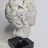 Clay sculpted head on marble base, 32 cm