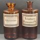 Antique apothecary pots in amber glass, set of 2 - 22 cm