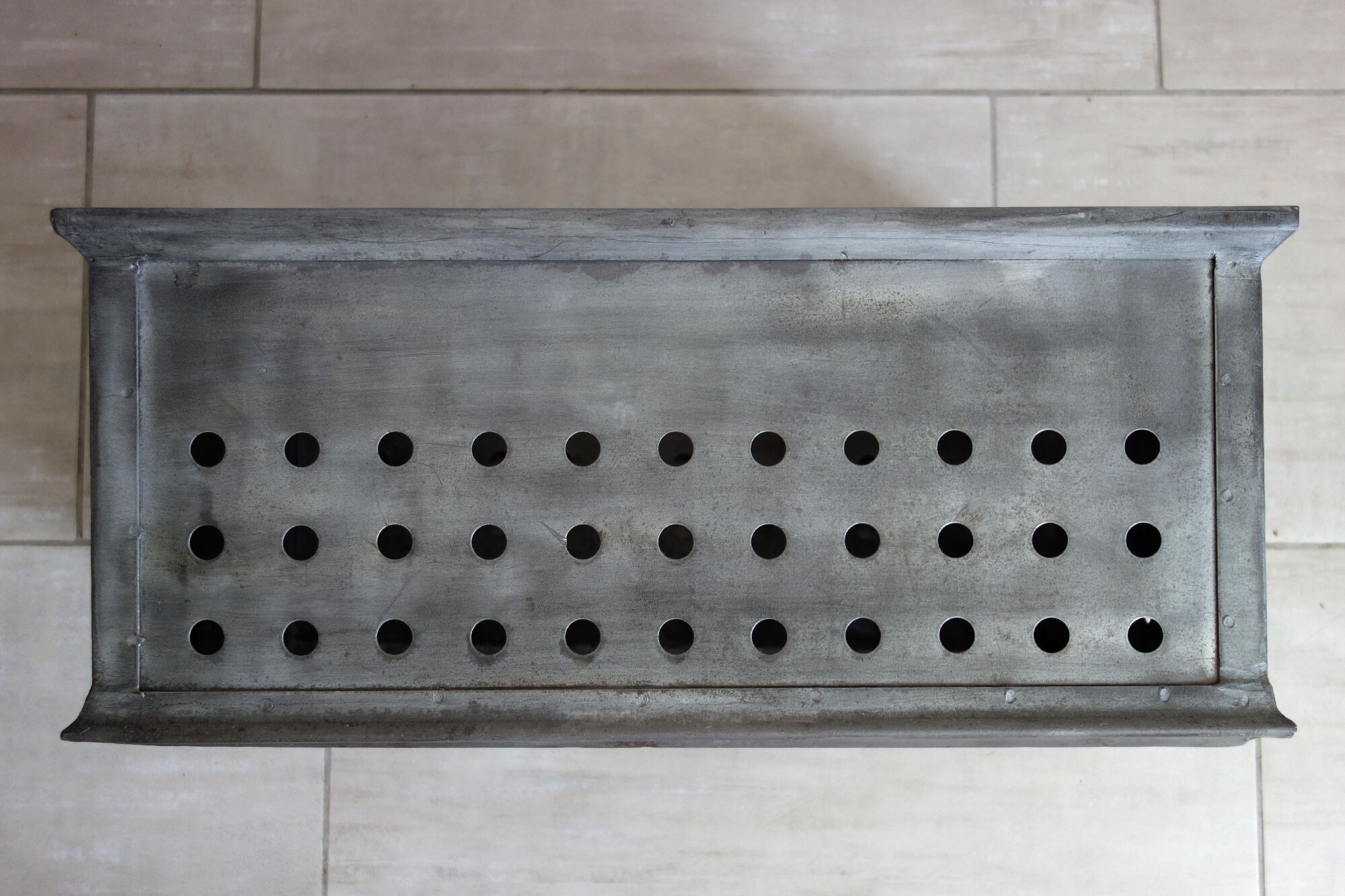 Old industrial box perfoated metal