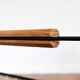 Metal magazine rack, wooden handle