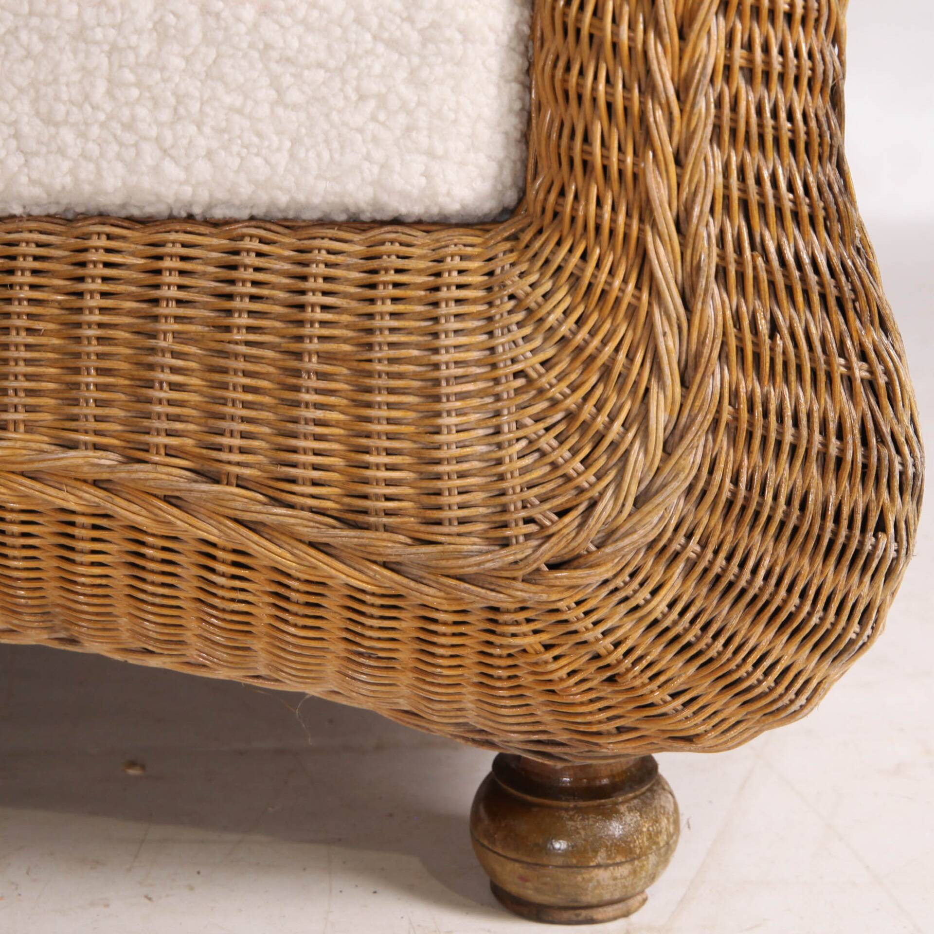 Pair of woven wicker armchairs
