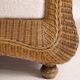 Pair of woven wicker armchairs