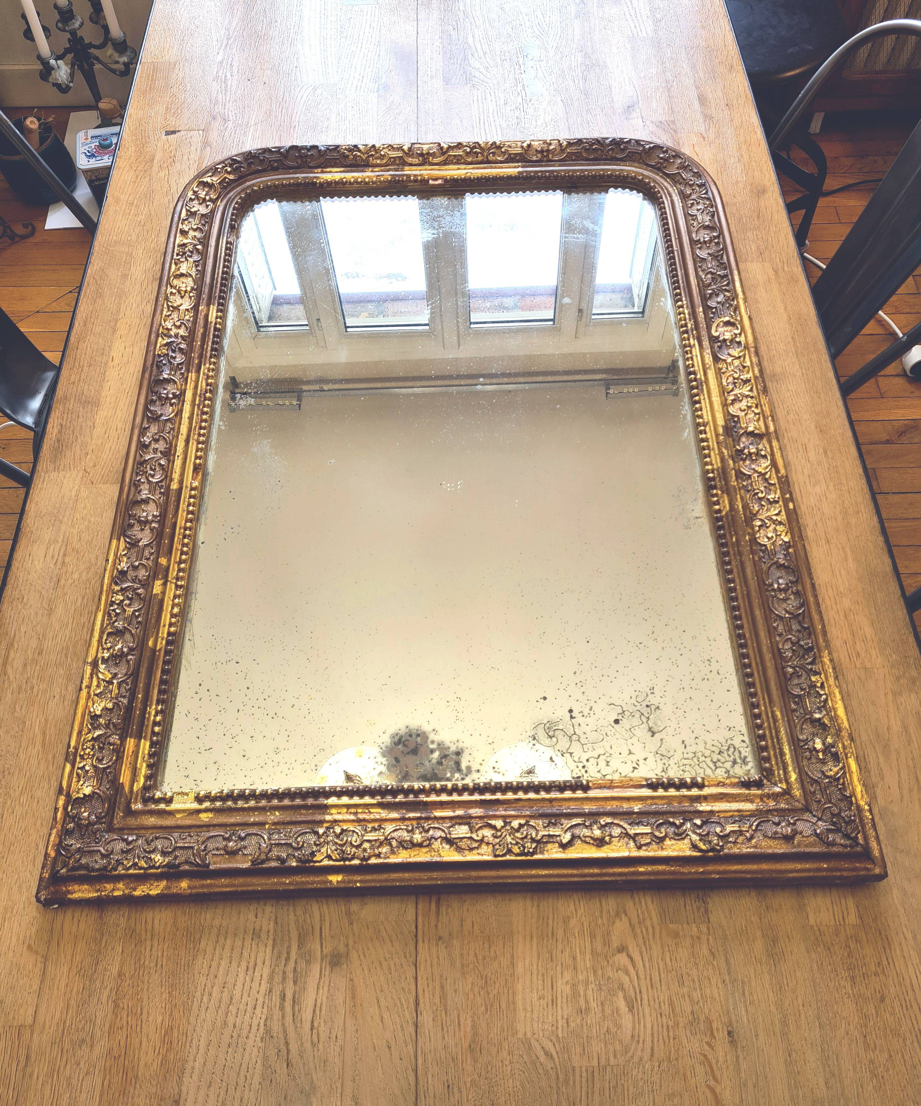 Old Louis Phillipe mercury mirror, in gilded stucco.