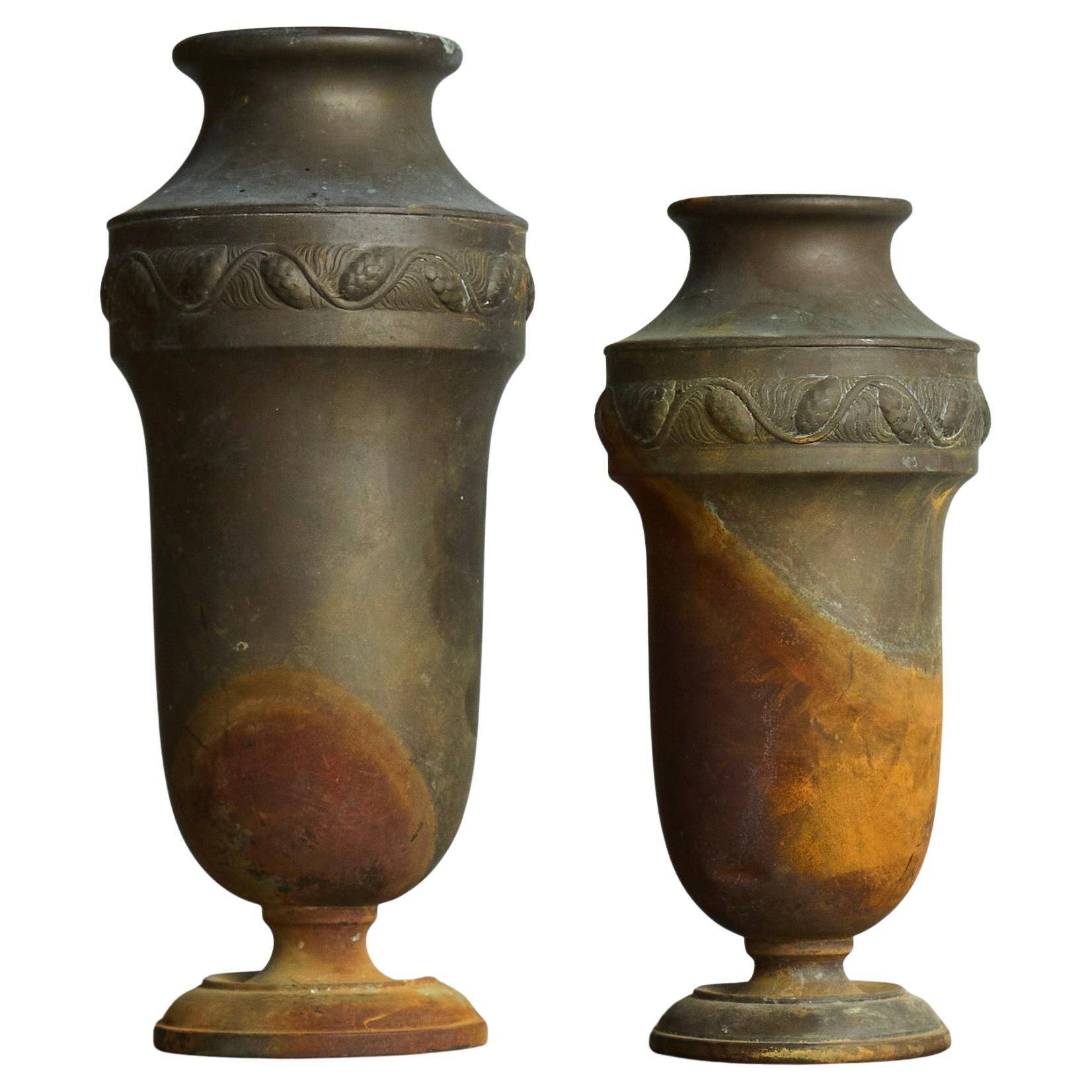 Pair of Art Deco vases in patinated metal