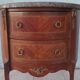 Half-moon commode in Louis XV style with walnut veneer.