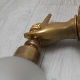 Pair of golden bronze flambeau sconces