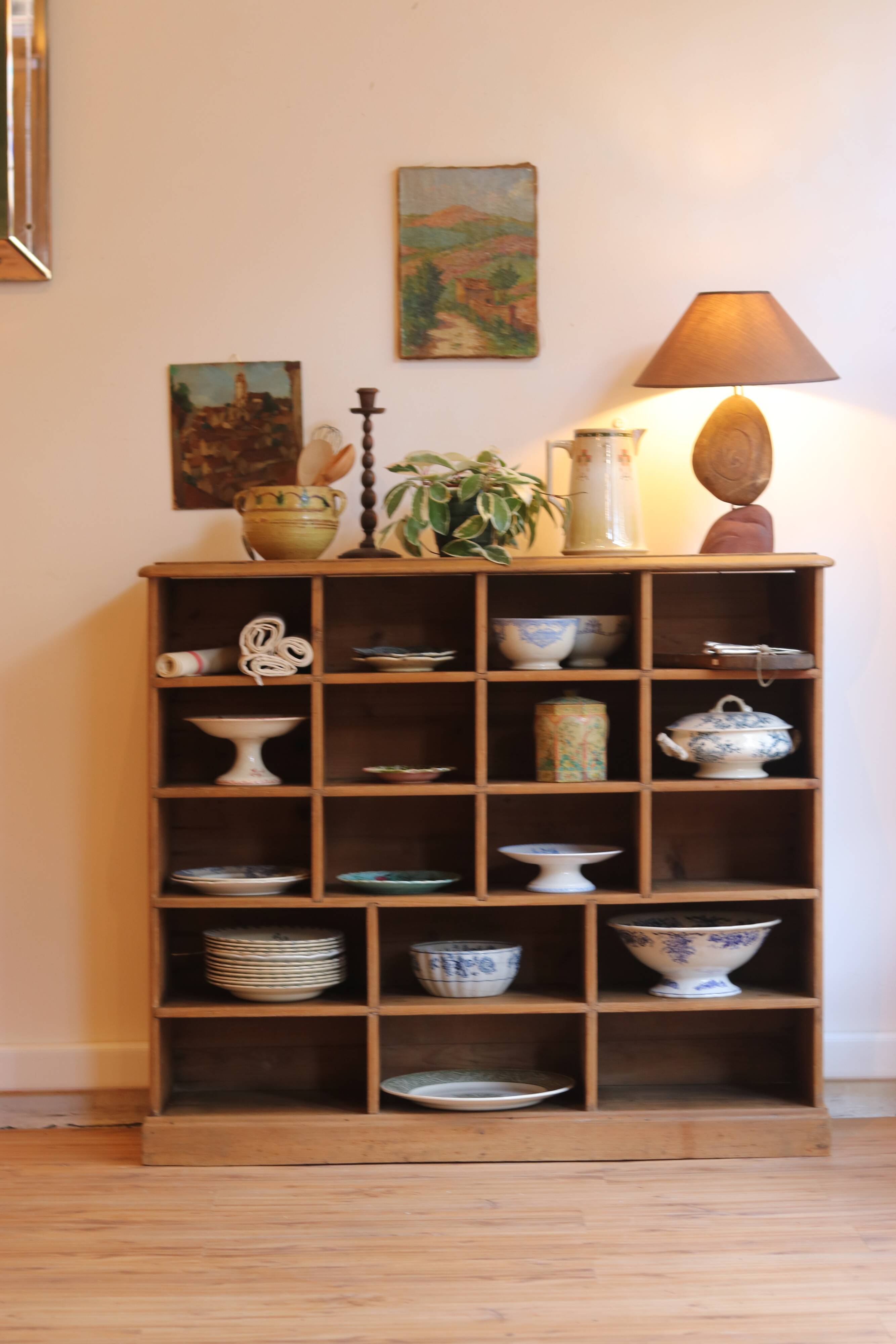Large storage unit with compartments in waxed pine, early 20th century.
