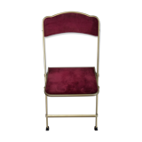 Chaise pliante en métal doré et velours rouge