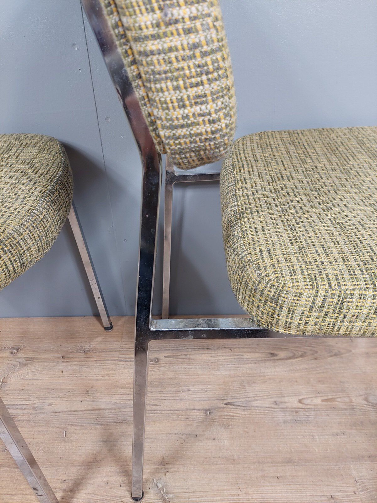 Pair of vintage chairs in fabrics and metal