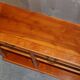 Vintage yew wood library/buffet with three drawers.