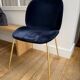GUBI Beetle designer chair in midnight blue velvet with brass base