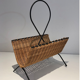 Rattan and black lacquered metal magazine rack