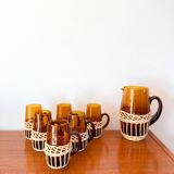 set of carafe and 6 cups in amber glass with wicker from the 70s