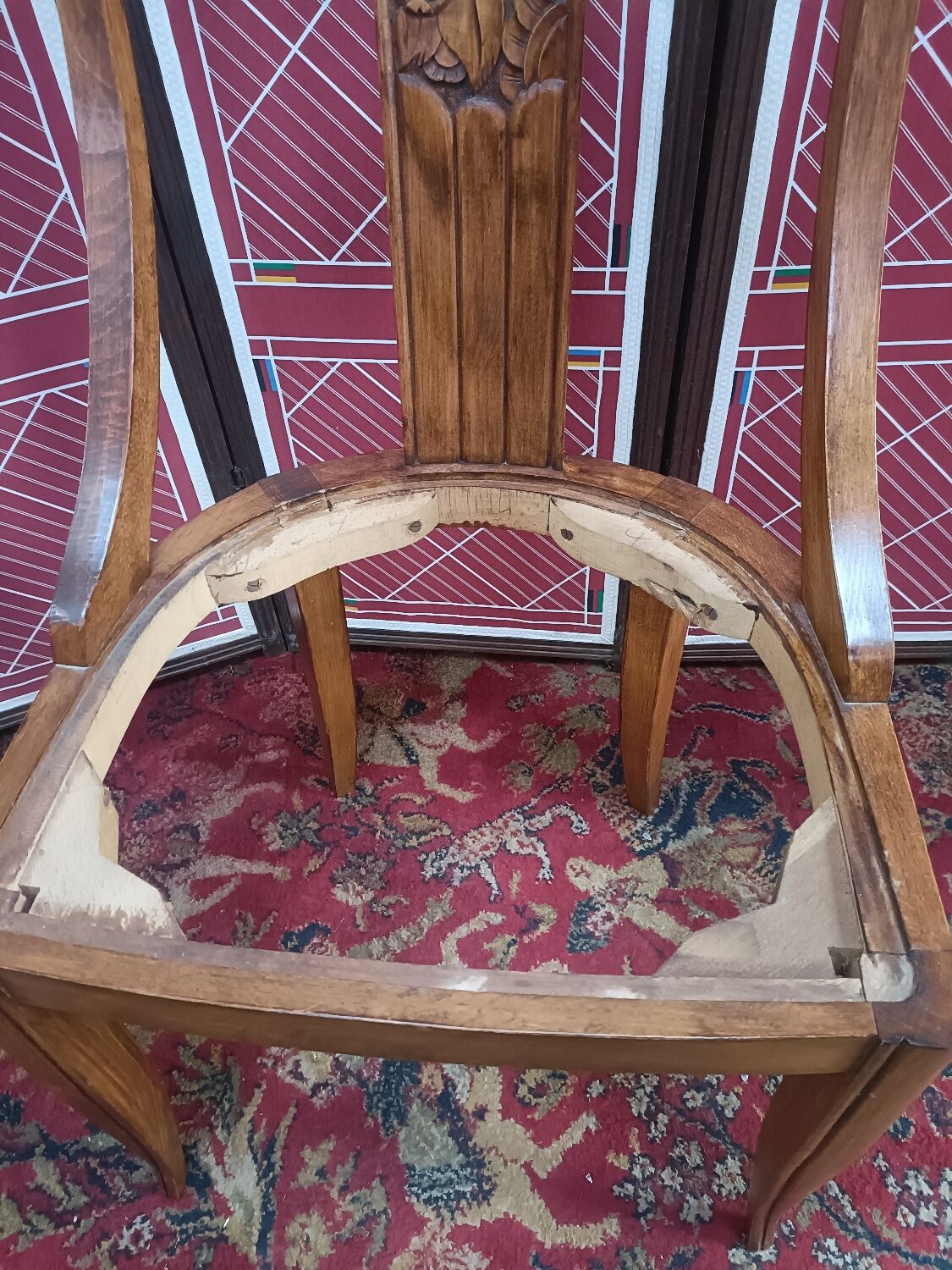 Gondola chair with art-deco motifs, spring leatherette seat