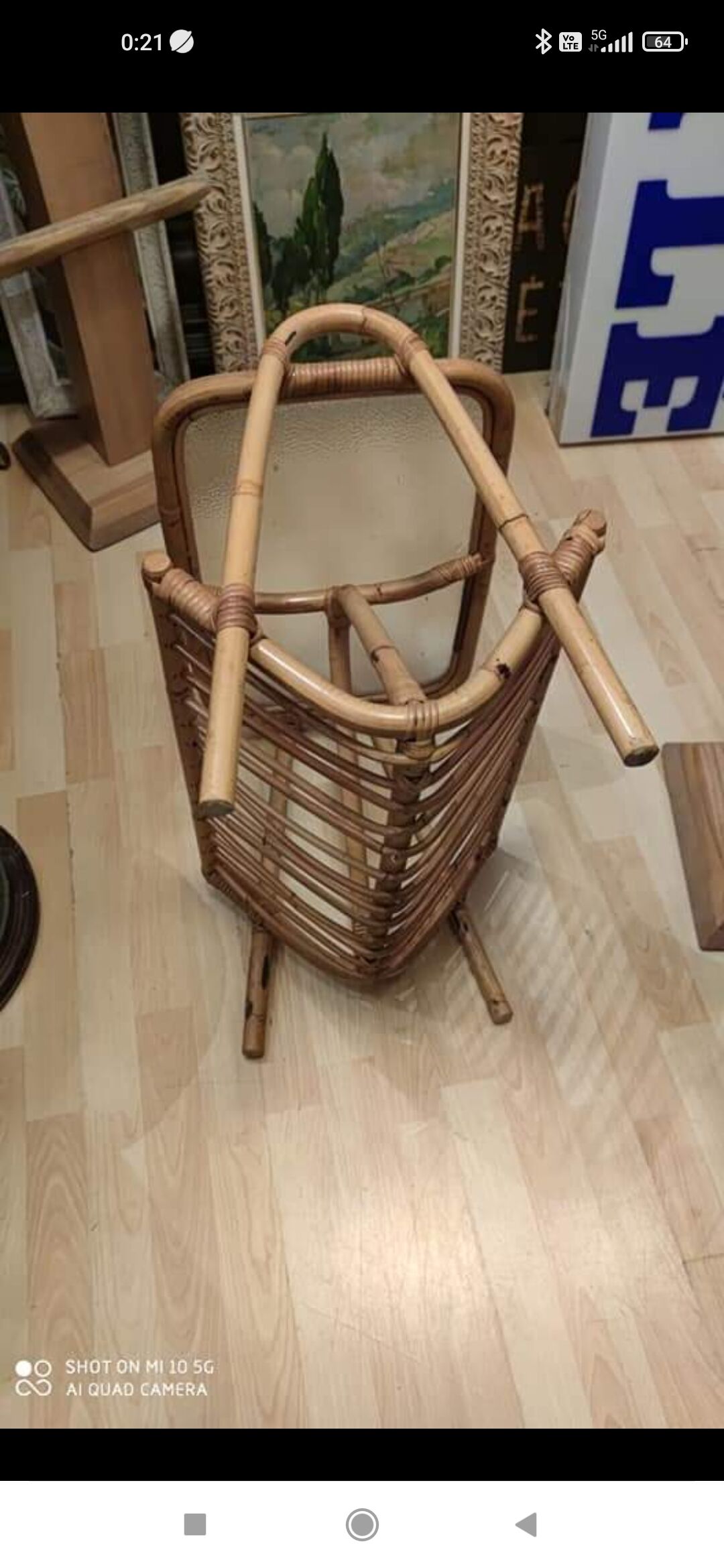 Rattan and frosted glass end table with magazine rack