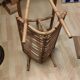 Rattan and frosted glass end table with magazine rack