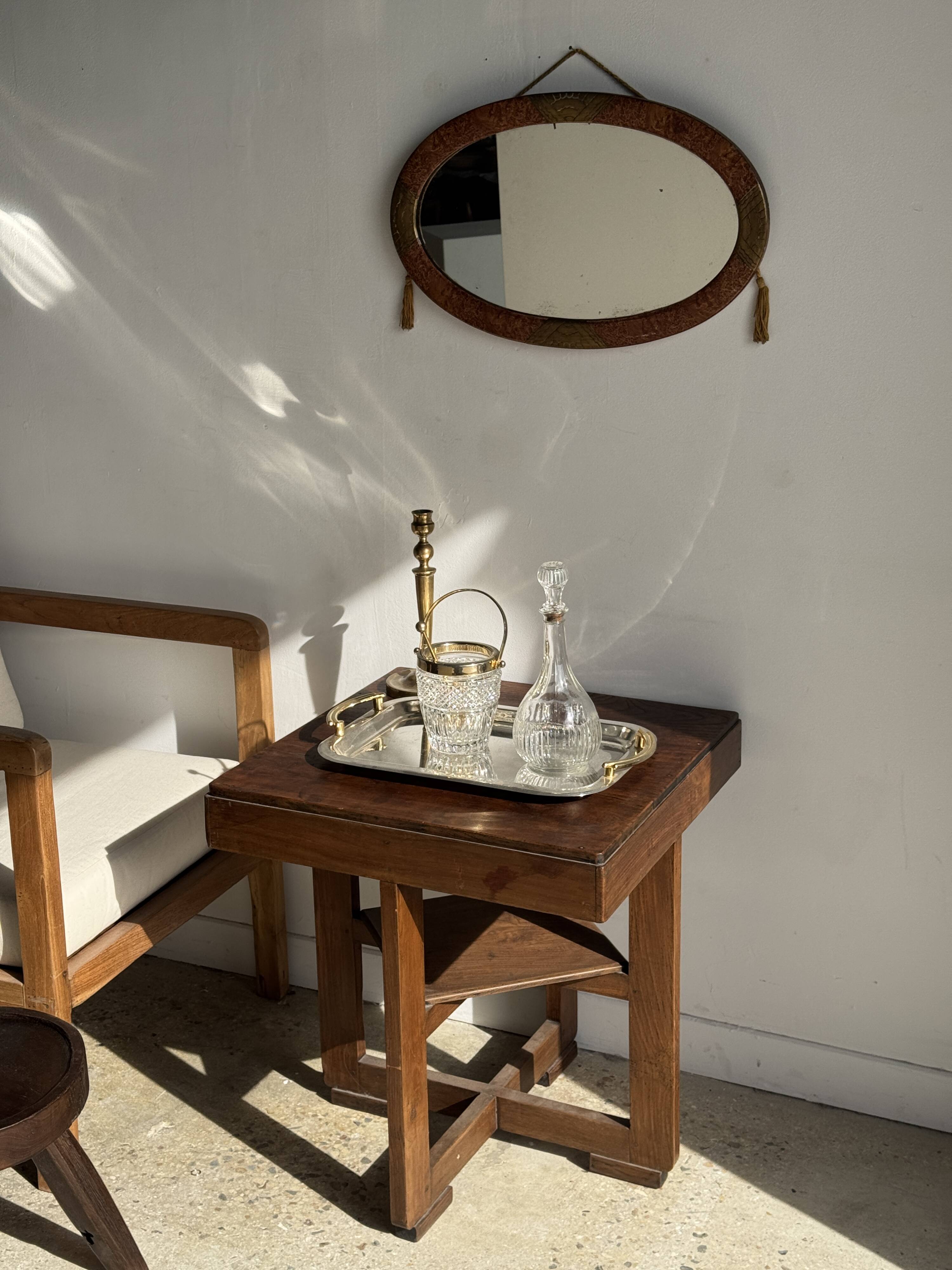 Small oval Art Deco mirror in brown and gold 33x54.