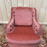 Fauteuil style crapaud en velours rose capitonné