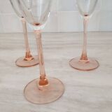 6 champagne flutes with pink stems