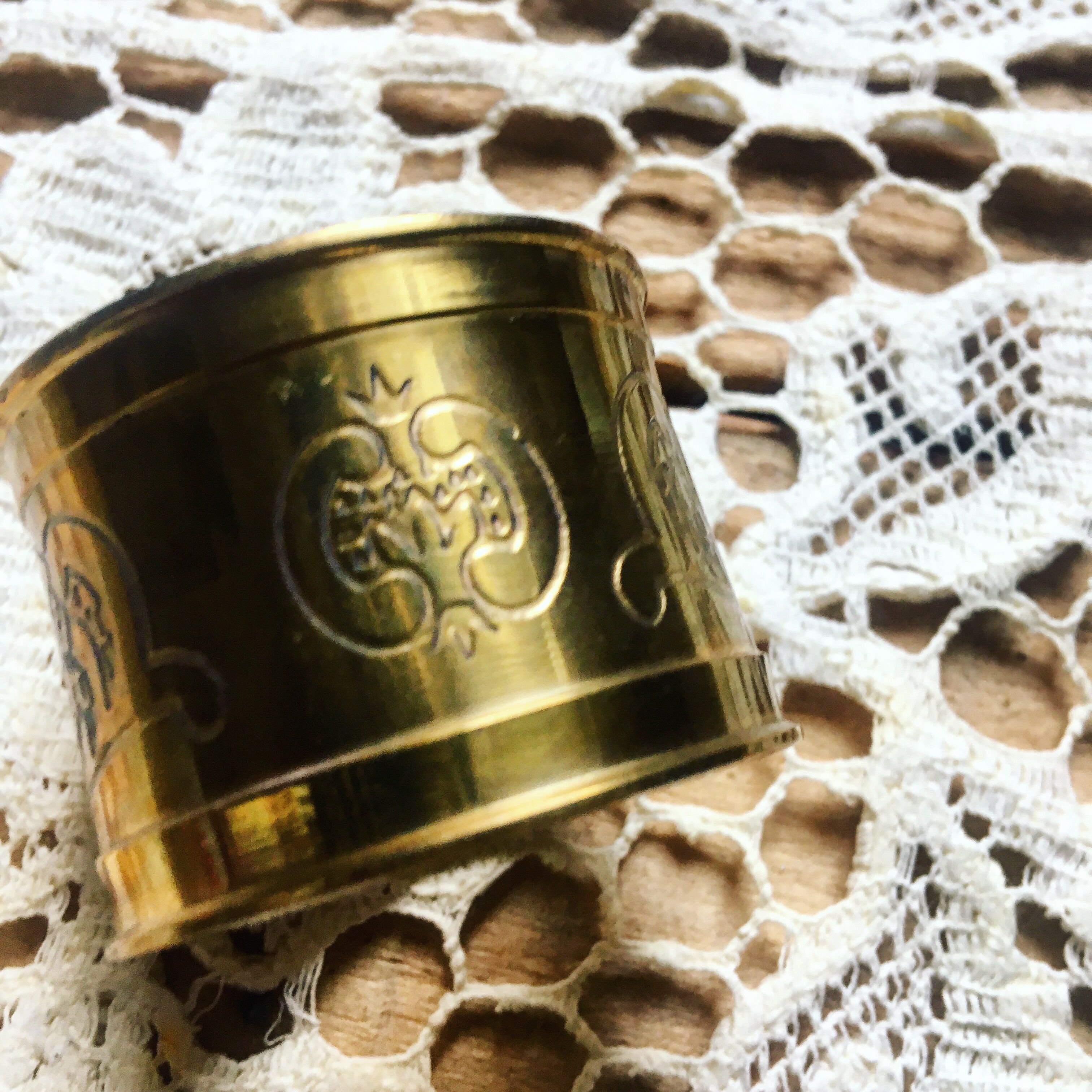 Four rounds of old brass towel around 1930