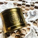 Four rounds of old brass towel around 1930